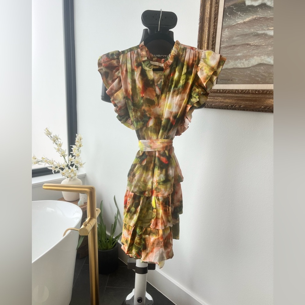 Ruffled sleeves and skirt, tie around waist